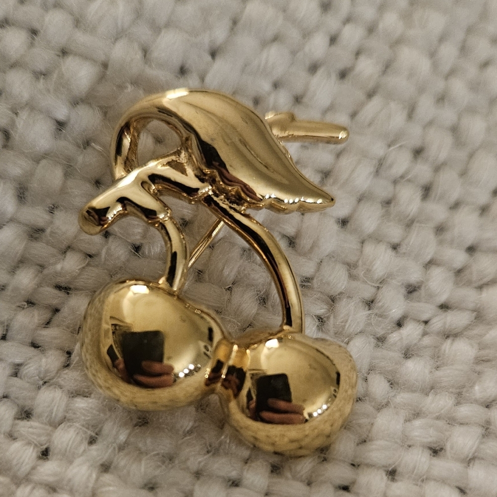 Monet Cherries goldtone brooch